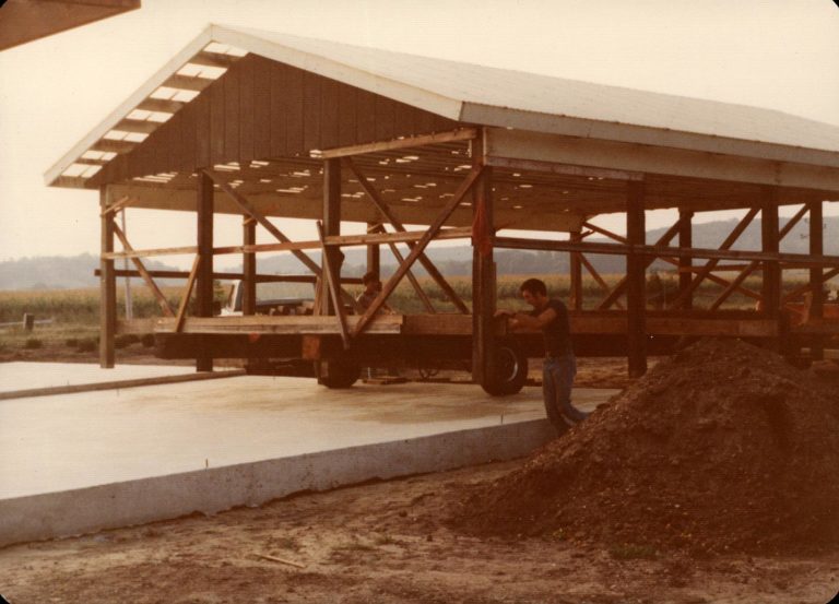 Moving two buildings from the Miracle Mile location to the new location, 1976.