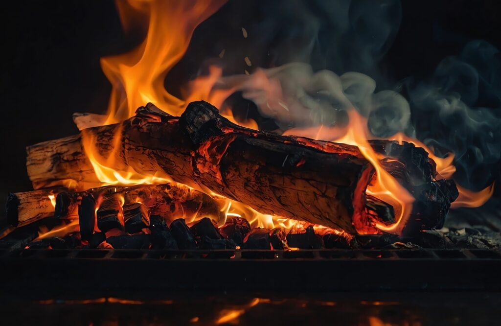 Burning logs in a fire pit.