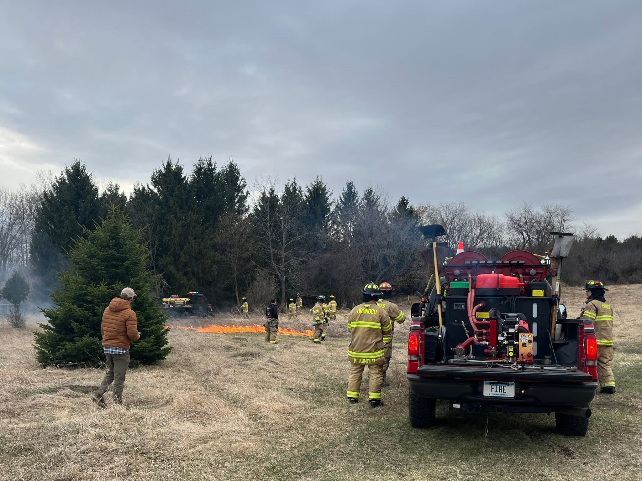 The Oronoco fire department holding a training exercise by burning the Sargent's pollinator prairie